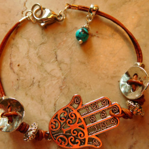 Natural dye Brown leather with Hamsa charm and decorative silver tone buttons.  #B00214