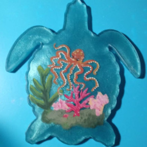 Sea turtle painted resin.