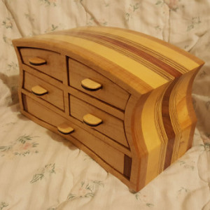 Jewelry box made from quilted maple,patagonia rosewood,wenge, pine,and plywood