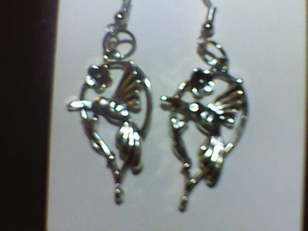 Humming bird homemade earrings, Silver in color.