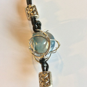 Wire wrapped polished stone, leather bracelet
