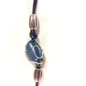Wire wrapped polished stone leather bracelet, dark blue stone 
