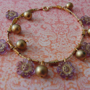 Golden Snake Chain Purple Flower Czech Beads Golden Round Bead Bracelet is adjustable