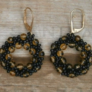 Black and amber beaded hoop earrings