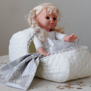 Pattern #4 Doll bassinet carrier of quilted cotton with a pillow and a blanket