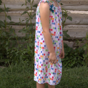 Upcycled pillowcase dress with removable flower