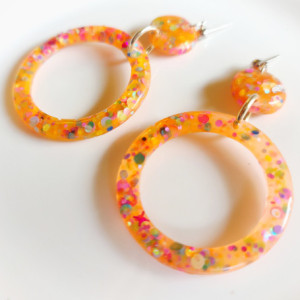 Orange resin dangling earrings, hoops