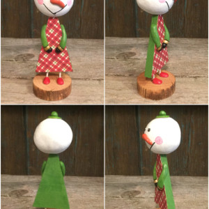 Wood snowman with clay head