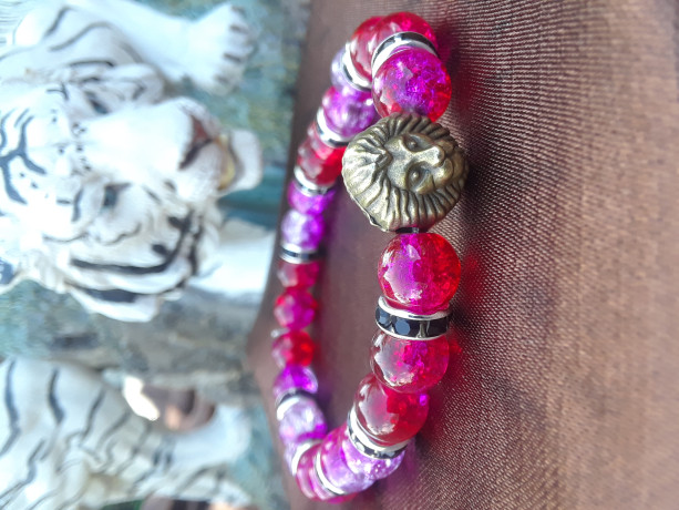 Red colored lion charmed braclet 