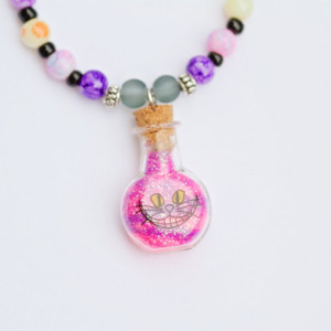 Alice in Wonderland Cheshire Cat sand in bottle necklace/Black network,coin beads,glass seed,tibetan silver spacers, jasper/Under 20 dollars
