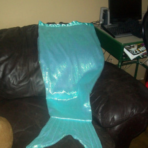 Child's Mermaid tail cocoon blanket.
