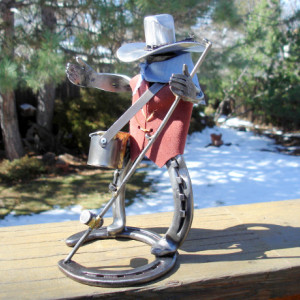 Cowboy sculpture fisherman