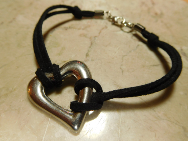 Black Suede/leather bracelet with stainless steel heart connector charm. #B00237
