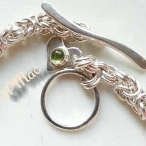 Byzantine weave chain maille sterling silver bracelet with sterling silver toggle closure and a peridot heart  charm