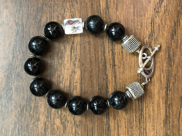 Bracelet with round black onyx beads, cz bead and sterling silver toggle, beads and findings 