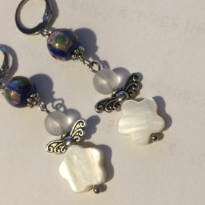 gs Mother pearl Angel wings earrings with blue ceramic beads and lever back hooks. #E00339