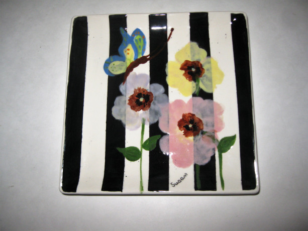 Haand painted Pansy on black and white stripe sandwich or salad plate