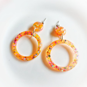 Orange resin dangling earrings, hoops