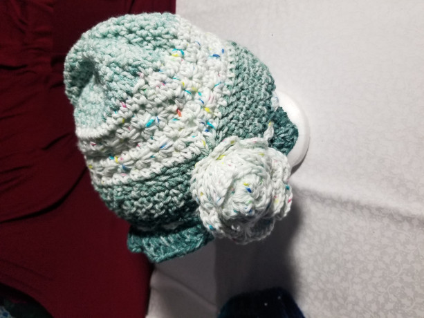Cozy green and white hued crochet bucket hat 