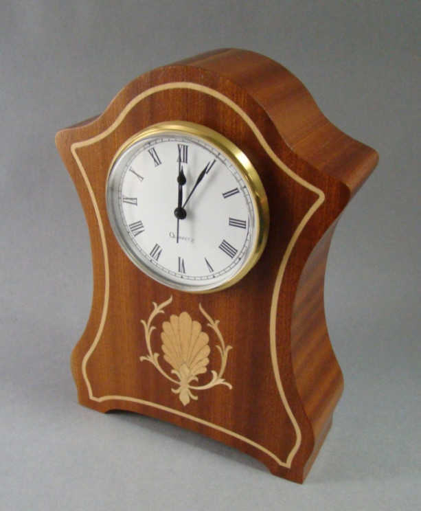 Mantle clock of Ribbon sapele with inlay.