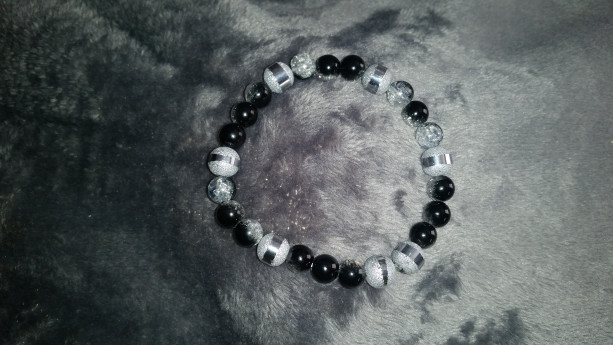 Black and silver tone beaded bracelets