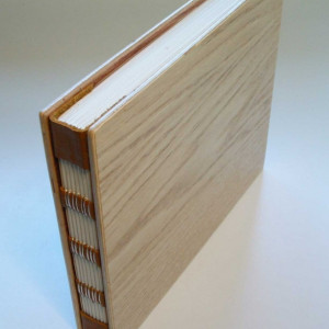 Handmade book, bound in wood and leather