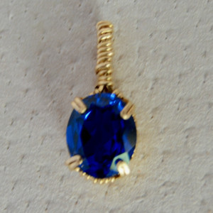 Blue oval synthetic sapphire faceted gemstone handmade pendant