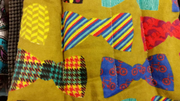 Colorful bow ties corn bag.