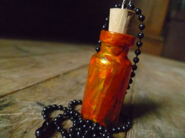 Handpainted Vial Necklace. Orange and gold toned.