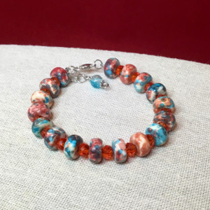 Multi colored orange and aqua beaded bracelet