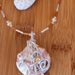 Natural wire wrapped topaz seashell