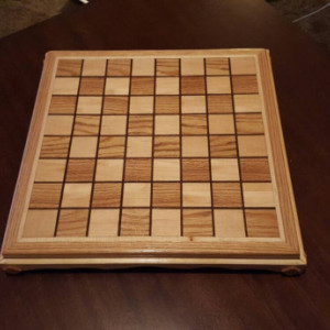 Chessboard made from oak and maple with black walnut inlays