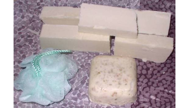 FREE SHIP Bulk lot of lye,goatsmilk,oatmeal, and tallow soap with scrubbie in assorted variety.