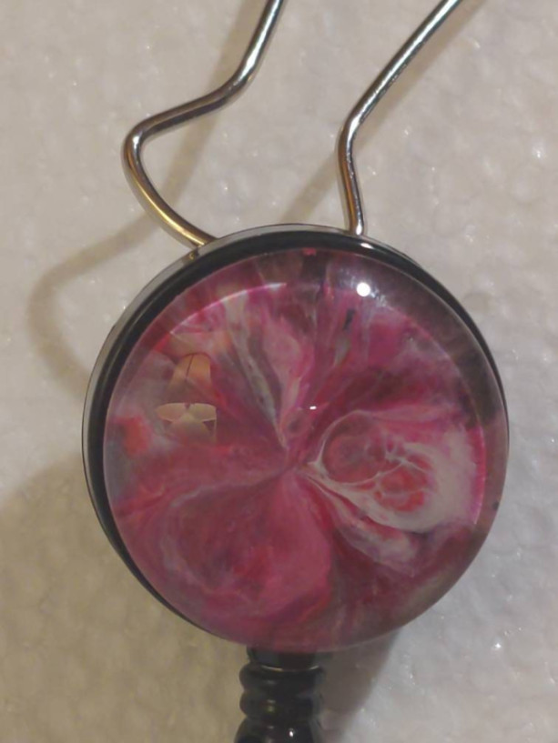 Hand painted glass cabochon badge reel. Clip on and retractable.