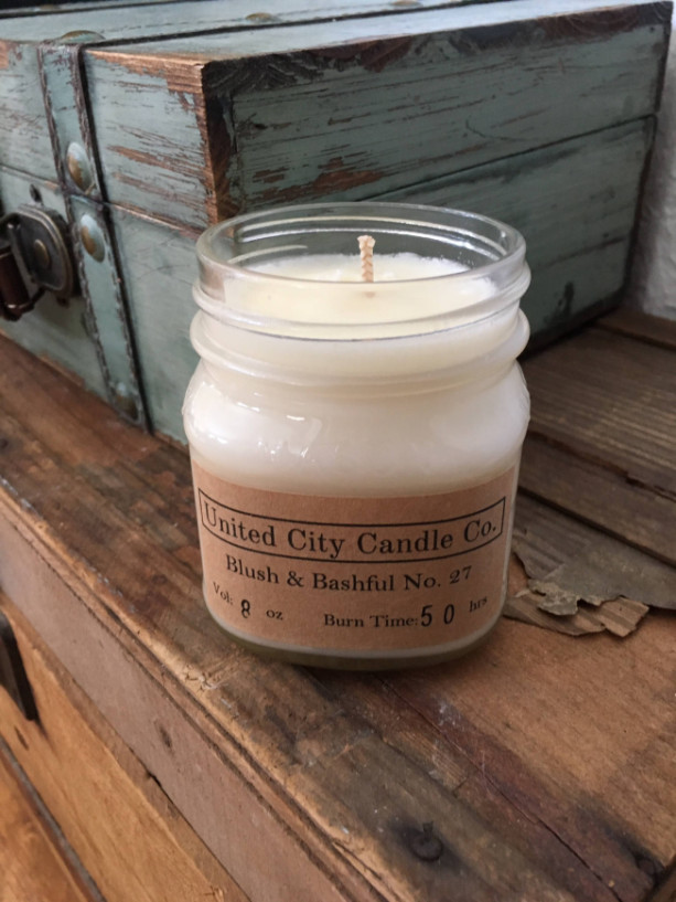 Blush & Bashful No. 27 --Shiny leaves and elegant white flowers adorn the magnolia. 100% soy candle. United City Candle Co.Made in USA