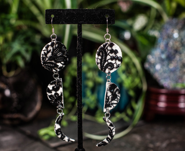 Polymer lace lunar cycle dangly earrings