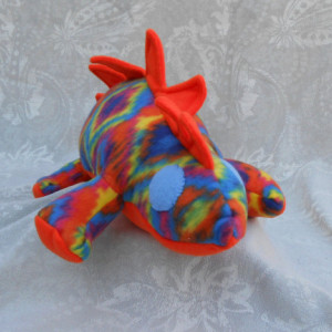 Rainbow Pattered Small Stegosaurs Dinosaur With Neon Orange Accents