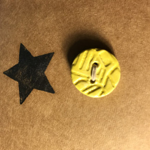 Yellow handmade button
