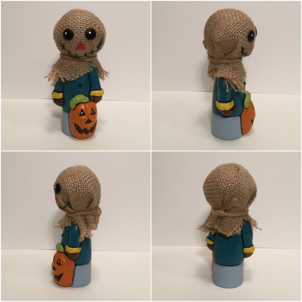 Scarecrow wood and clay figurine