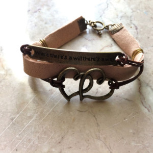 Beige/ natural leather bracelet with bronze tone plate connector said "Where there's a will there's a way" and double heart charm B00243