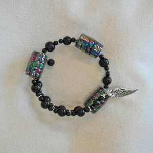 Unity in Trinity™ Gratitude Bracelet of Black Glass Beads with Wing