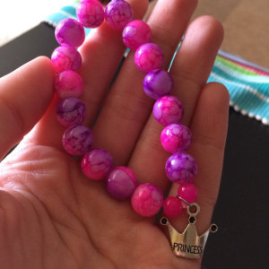 Stretch bracelet, silver princess crown charm, pink and purple