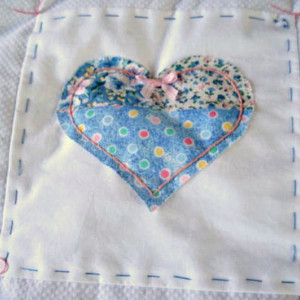 Unique White Baby Quilt, White Minky with Hand Embroidery, Blue and Pink Pieced hearts, Hand finished and tied