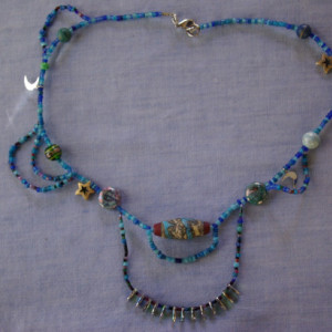 necklace of celestial beads in blue