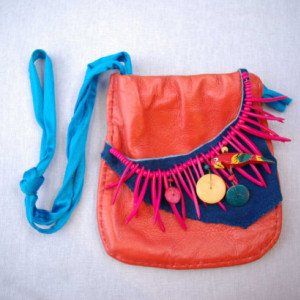 Hot tropical purse; made of leather with fruits to feed the tiny wild parrot