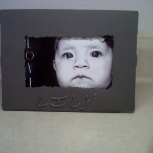 Handmade, customized picture frame. Welded metal, made to order.