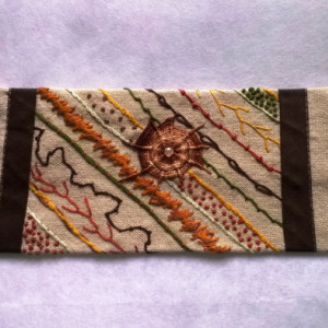 Hand Embroidered Cuff in Earth tones on Linen with Vintage Buttons and a Swarovski Crystal