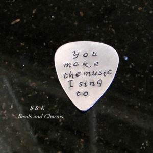 Custom stamped guitar pick