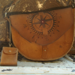 Rough and Rustic Leather Cross body Adventure bag with chained accessory wallet, unusual shape