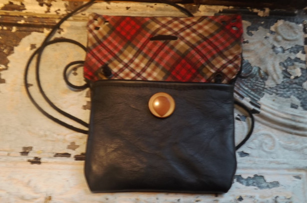 Perfect little black Bag for the girl on the go. Vintage Button, Black leather with cute plaid lining